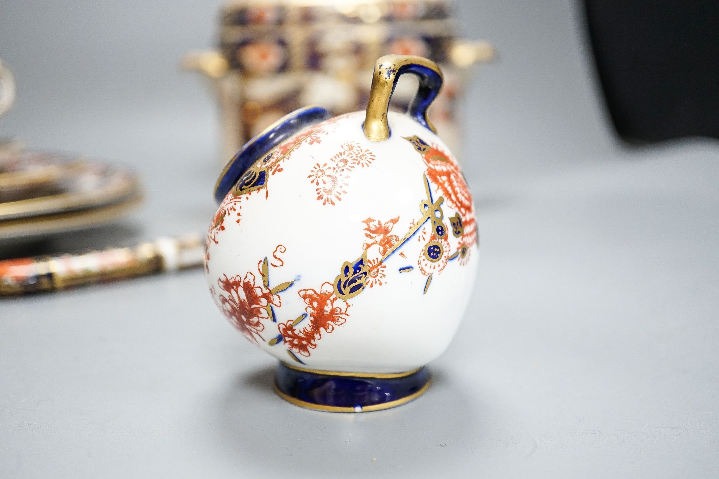 Royal Crown Derby tableware, including pair of dinner plates, 26cm, together with a pottery Imari pattern box and cover
